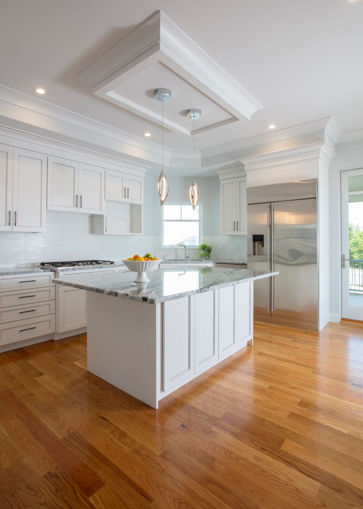 Wood floors in an open concept kitchen - Chester, Maryland -custom build by Lundberg Builders